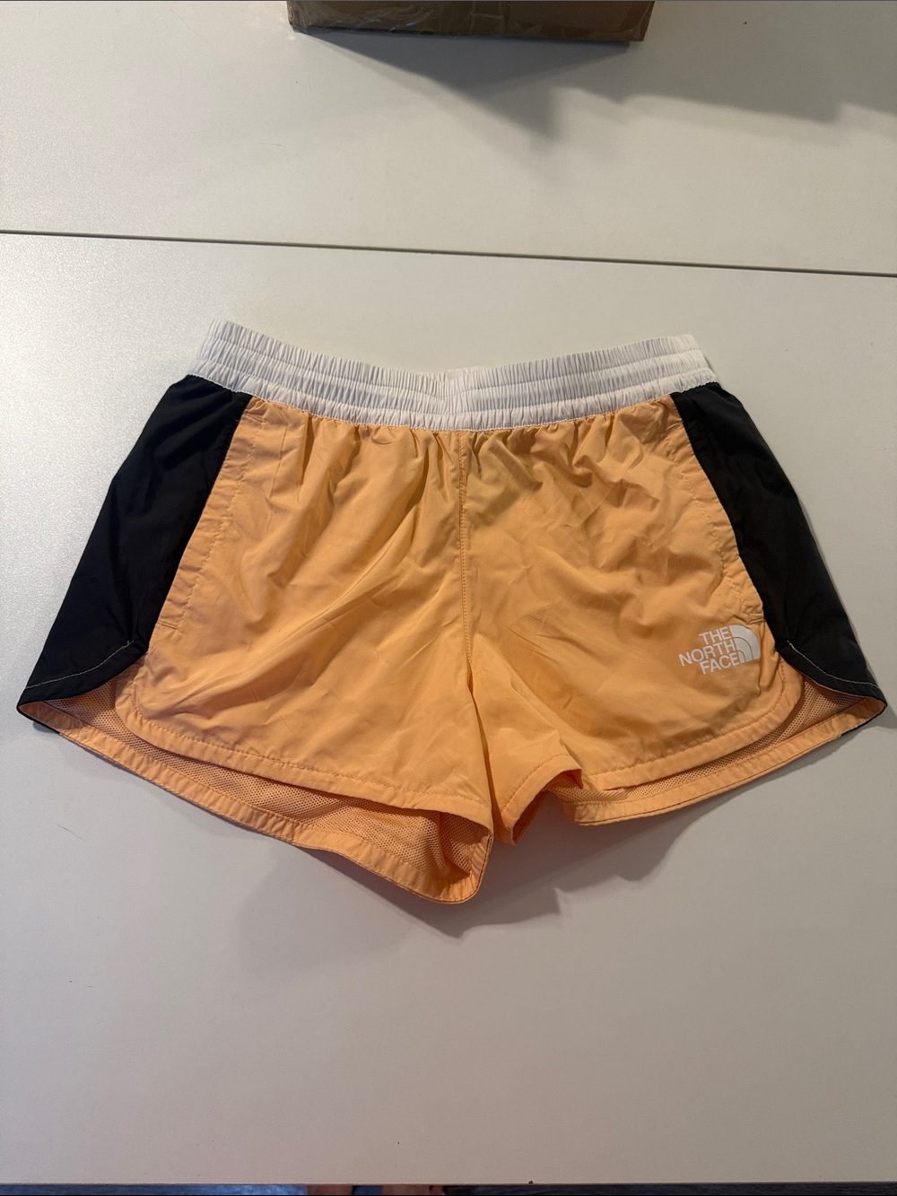 The North Face Peach Athletic Shorts with Black Side Panels